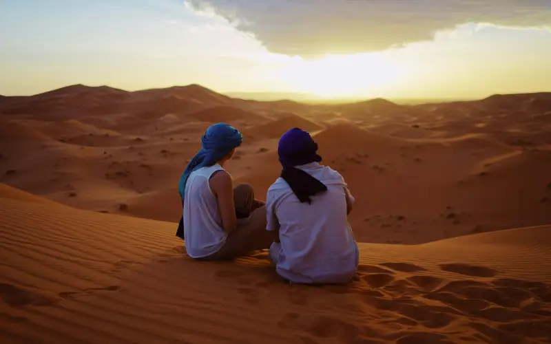 Sunset in the Sahara desert during a 10-day Morocco Imperial Cities and desert tour