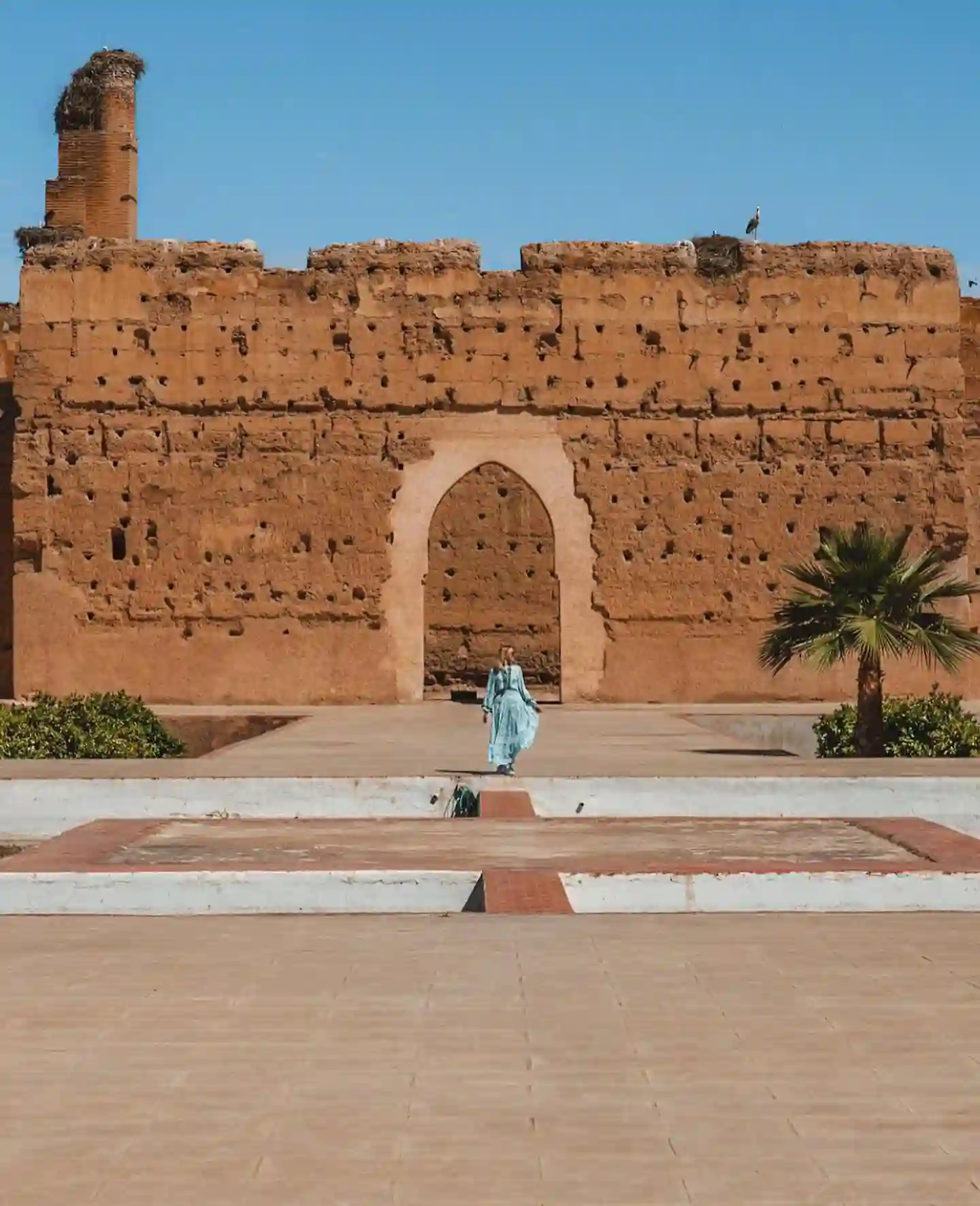 Solo woman traveler enjoying a 12-day Morocco journey through cities and the Sahara