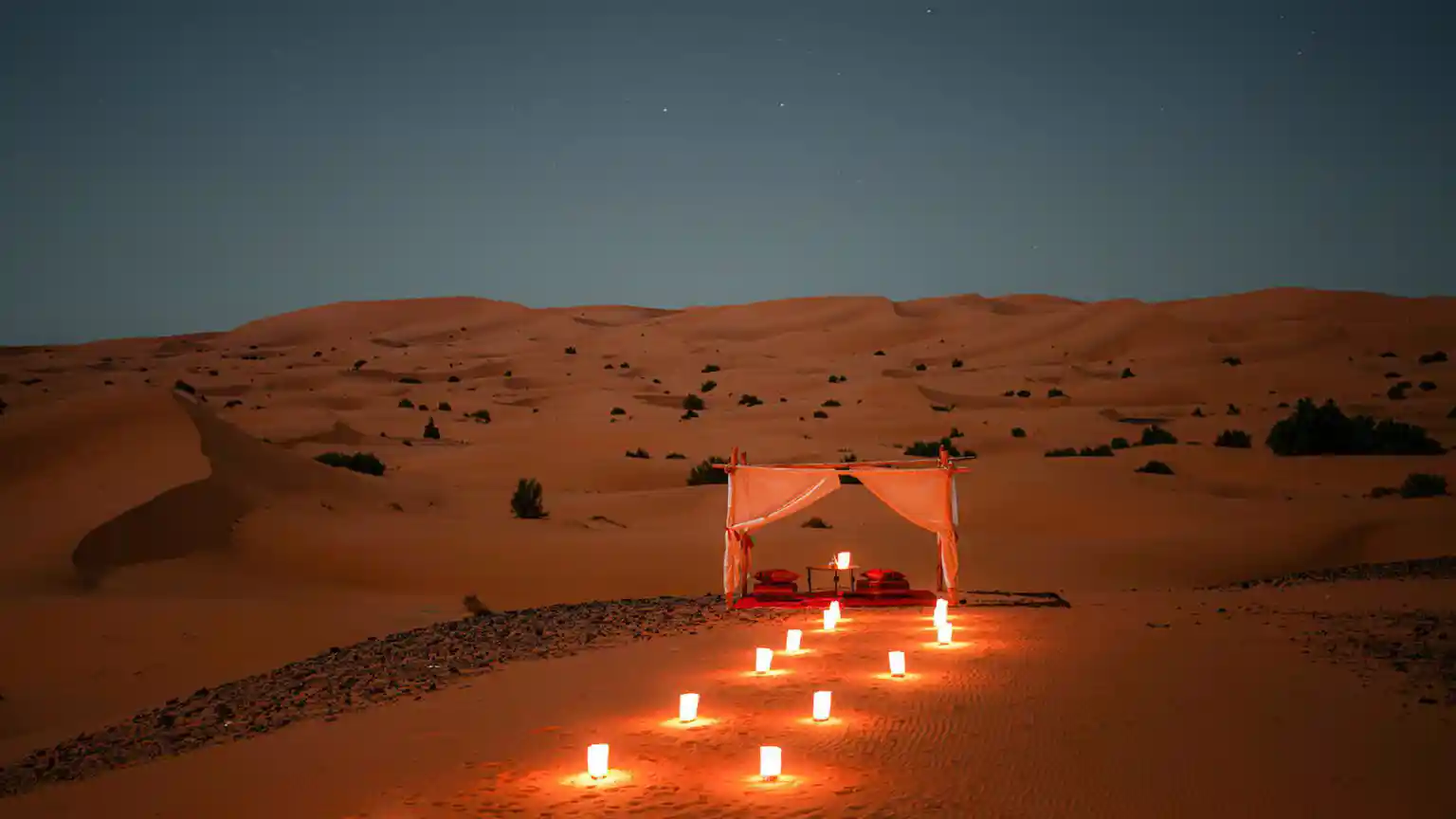 Luxury Sahara desert camp at night on a 3-day Fes to Marrakech desert tour